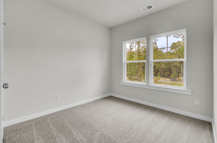 Spacious, unfurnished interior of a new home in Indigo Grove Townhomes, Johns Island (Image 38).
