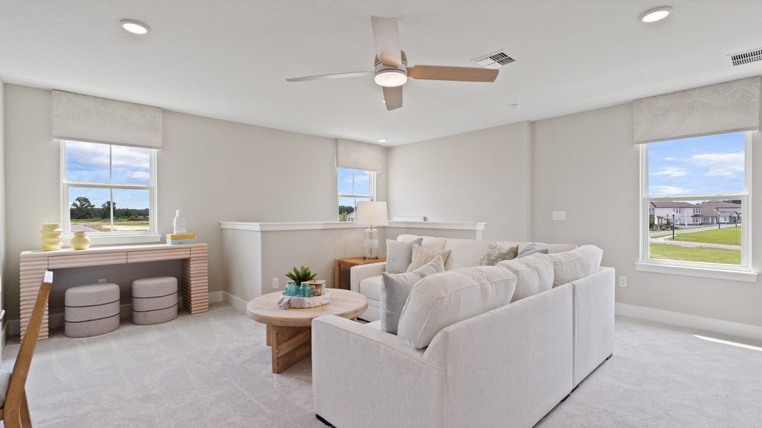 Representative furnished interior of a home built from the Sweetgum by DRB Homes in Trailside, Mount Dora (Image 59).