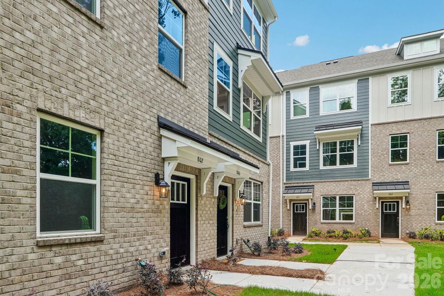 Exterior details and patio area of a home in Anderson Street Townhomes, Charlotte (Image 29).
