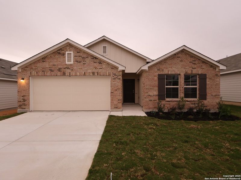 Front exterior of a new home in Paloma Park, Converse, TX, highlighting curb appeal (Image 2). Front exterior of a new home in Paloma Park, Converse, TX, highlighting curb appeal (Image 2).