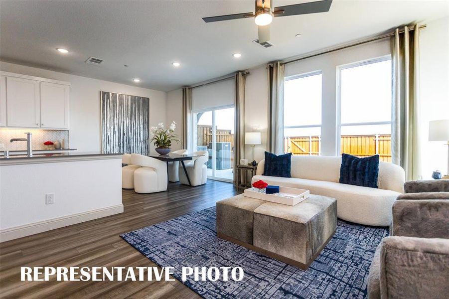 Family rooms designed to bring the outside in! REPRESENTATIVE PHOTO OF MODEL HOME.