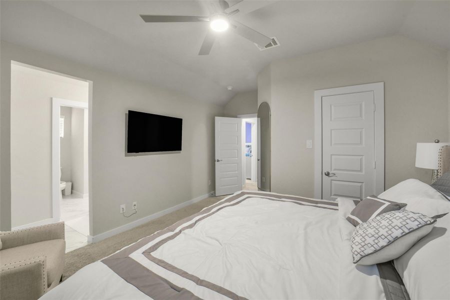 Well proportioned bedroom featuring a bright and inviting atmosphere.