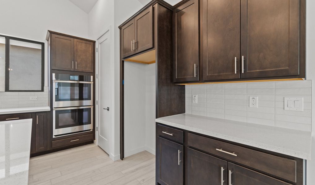 Kitchen with wall oven Kitchen with wall oven