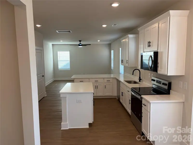 Furnished interior view inside a new home in , Lenoir (Image 5).