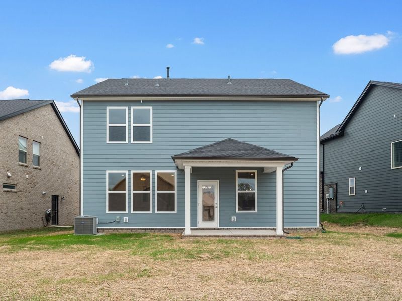 Exterior details and patio area of a home in Woods Crossing, Gallatin (Image 27).