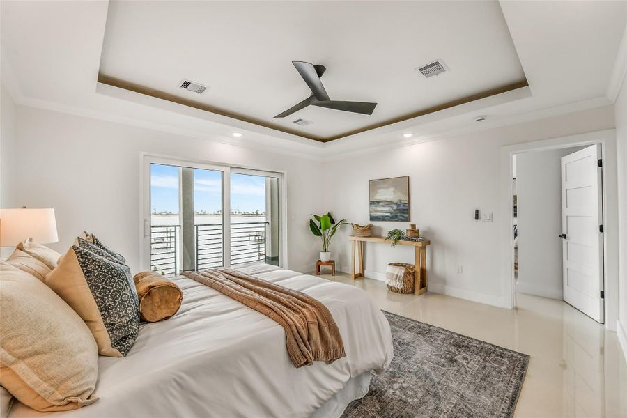 Soft natural light keeps the primary suite calm and inviting. The spacious layout feels gracious while maintaining easy access to the adjoining bath and outdoor space. Soft natural light keeps the primary suite calm and inviting. The spacious layout feels gracious while maintaining easy access to the adjoining bath and outdoor space.