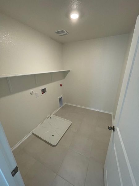 Furnished interior view inside a new home in Mustang Valley, Manor (Image 8). Furnished interior view inside a new home in Mustang Valley, Manor (Image 8).