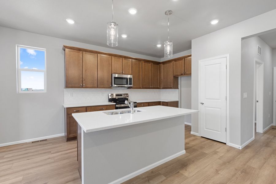 Furnished interior view inside a new home in Talon Pointe, Thornton (Image 5).
