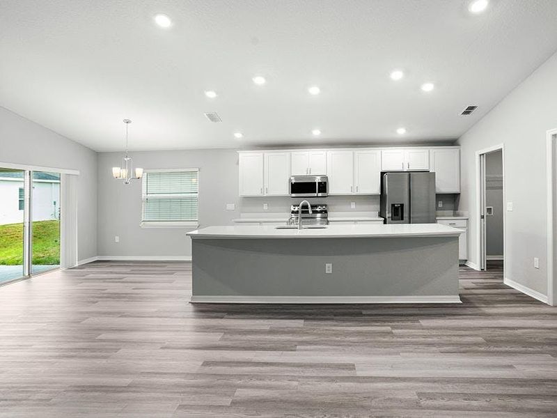 Dine at the island or adjacent dining cafe - Paisley by Highland Homes