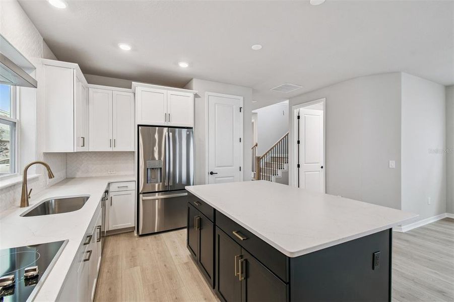 Furnished interior view inside a new home in Weslyn Park in Sunbridge 34', St. Cloud (Image 6).