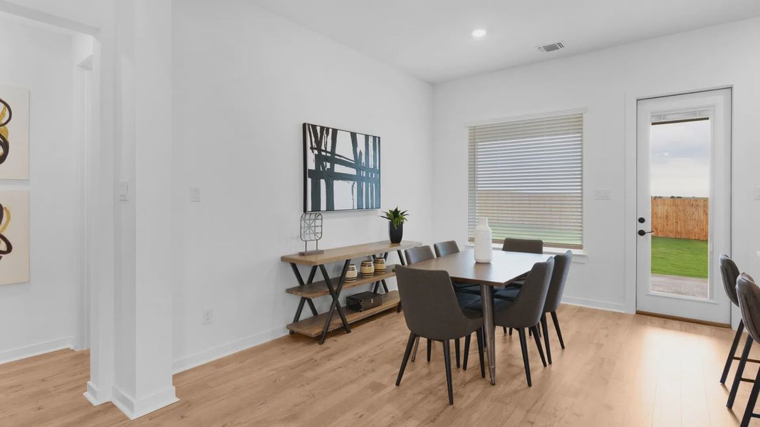 Furnished interior view inside a new home in The Grove at Blackhawk, Pflugerville (Image 12).