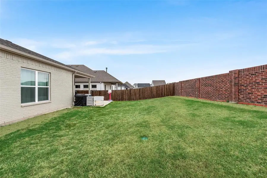 Exterior details and patio area of a home in , Aledo (Image 26).