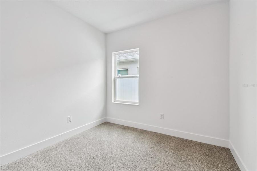 Spacious, unfurnished interior of a new home in The Peninsula at Rhodine Lake, Riverview (Image 33).