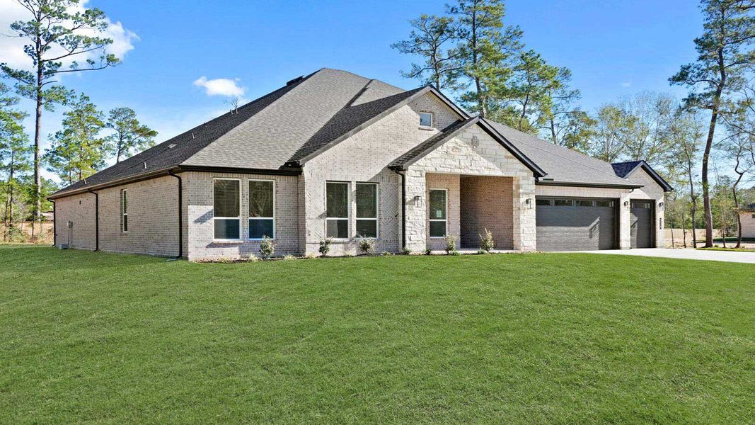 Representative exterior photo of a completed home built from the Galway by D.R. Horton in Butlers Bend Estates, Pinehurst, TX (Image 30). Representative exterior photo of a completed home built from the Galway by D.R. Horton in Butlers Bend Estates, Pinehurst, TX (Image 30).