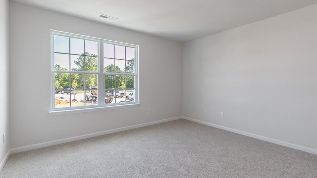Spacious, unfurnished interior of a new home in Brightwood Farm, Whitsett (Image 21).