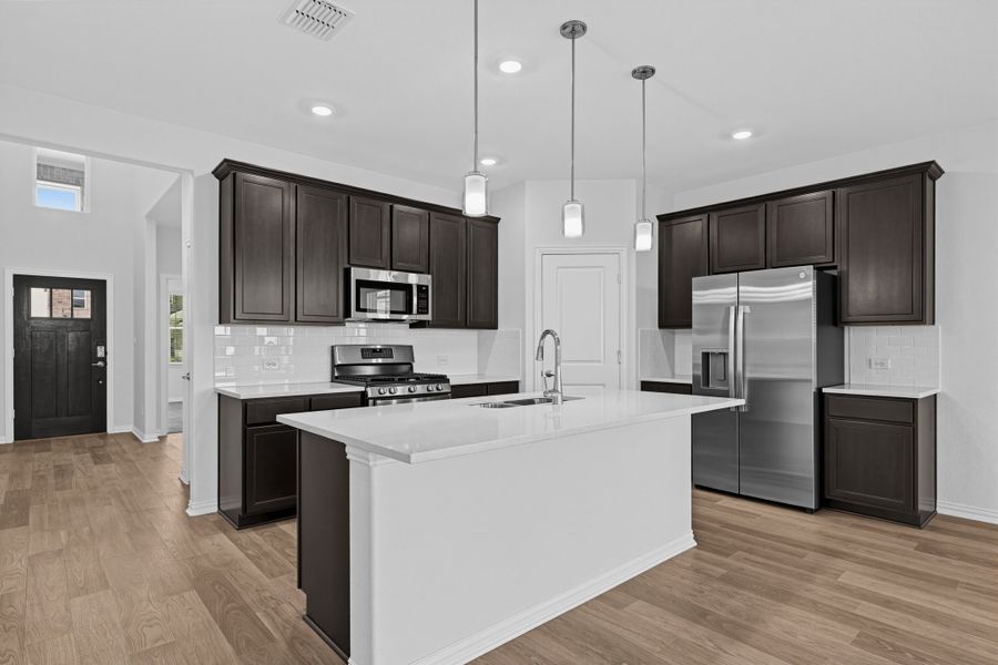 Furnished interior view inside a new home in Parks at Foster Crossing, Anna (Image 7).