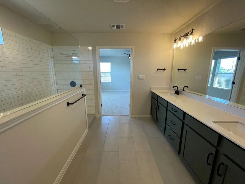 Furnished interior view inside a new home in Covered Bridge, Hutto (Image 12). Furnished interior view inside a new home in Covered Bridge, Hutto (Image 12).