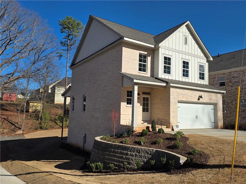 Front exterior of a new home in , Buford, GA, highlighting curb appeal (Image 1). Front exterior of a new home in , Buford, GA, highlighting curb appeal (Image 1).