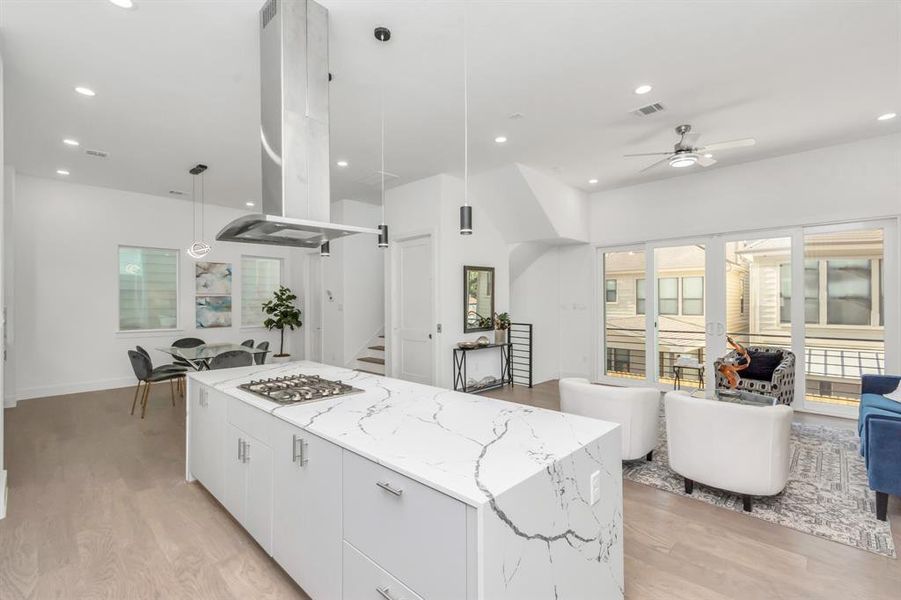 Expansive Kitchen Island Complete with a Built-In Microwave