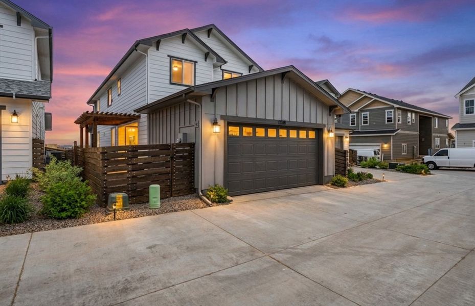 Front exterior of a new home in Barefoot Village, Firestone, CO, highlighting curb appeal (Image 1). Front exterior of a new home in Barefoot Village, Firestone, CO, highlighting curb appeal (Image 1).