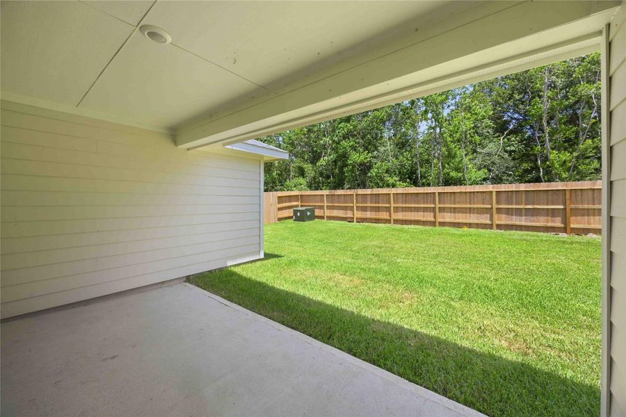 Exterior details and patio area of a home in Sundance Cove, Crosby (Image 19).