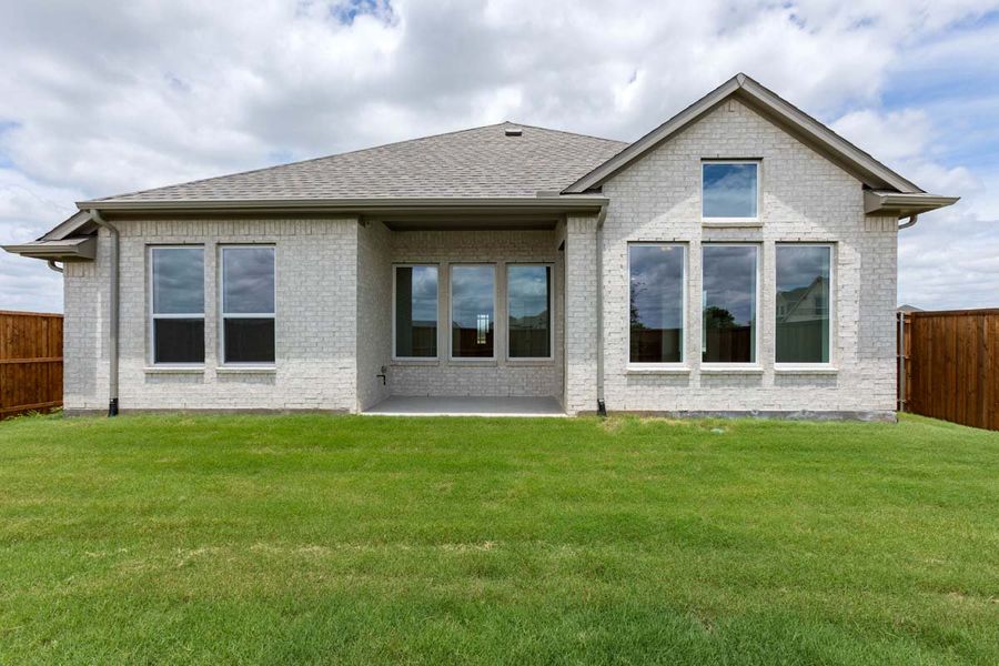 Exterior details and patio area of a home in Timberbrook, Justin (Image 4).