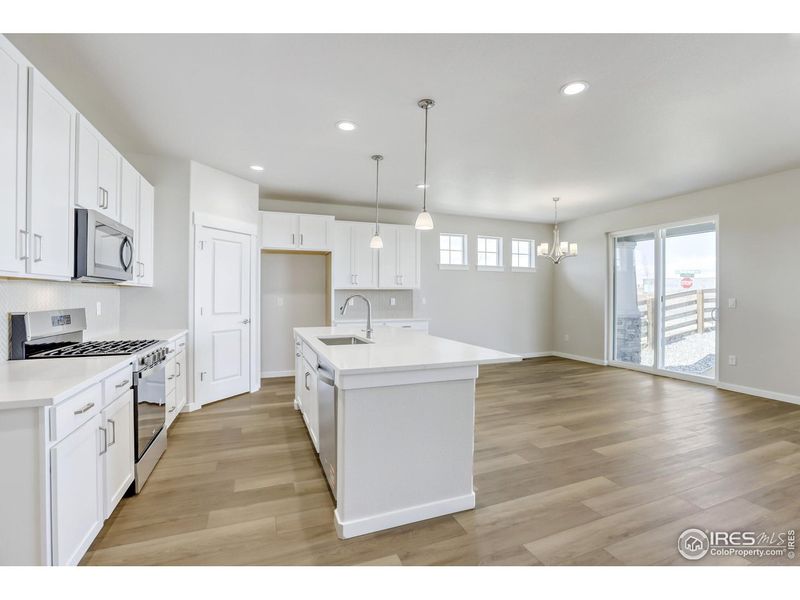 Furnished interior view inside a new home in Barefoot Lakes, Firestone (Image 9).