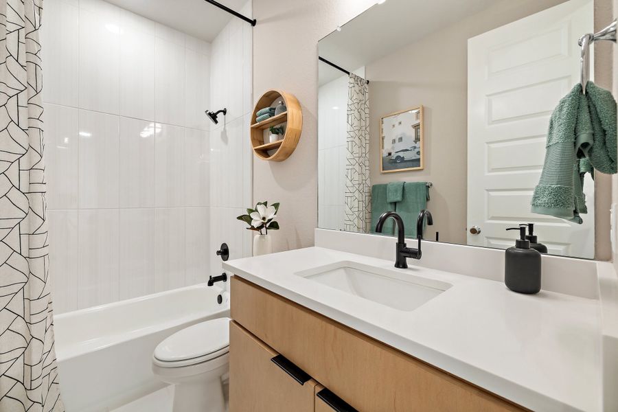Furnished interior view inside a new home in Heritage, Dripping Springs (Image 50).