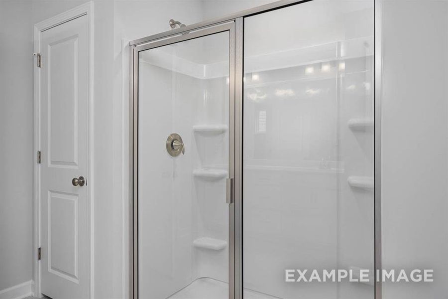 Bathroom with an enclosed shower