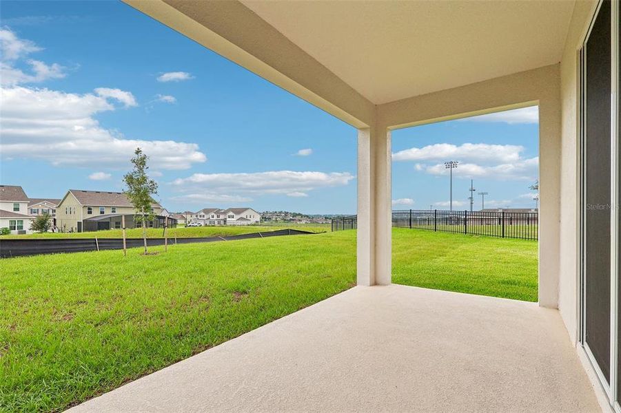 Exterior details and patio area of a home in Park View at the Hills, Minneola (Image 19).