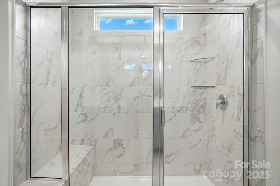 primary shower with seat