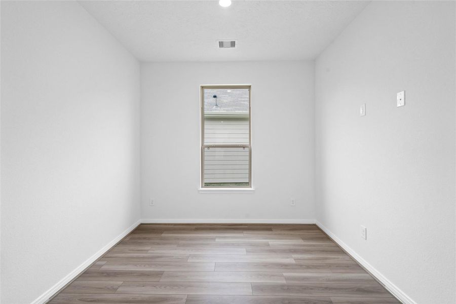 The Den offers a versatile space that seamlessly expands your living options—perfect for a home office, playroom, media space, or whatever suits your lifestyle. The Den features vinyl plank flooring, custom neutral tone paint, high ceilings, recessed lighting and a large window allowing in plenty of natural light!