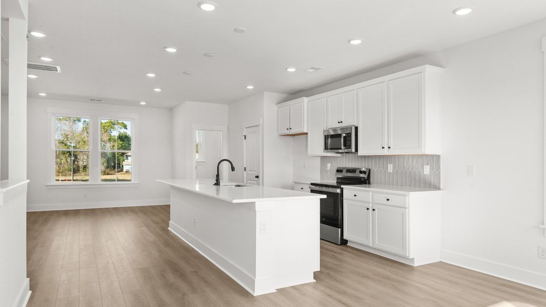 Furnished interior view inside a new home in Seabreeze Crossing, Little River (Image 7).