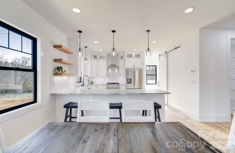 Furnished interior view inside a new home in , Hendersonville (Image 7).
