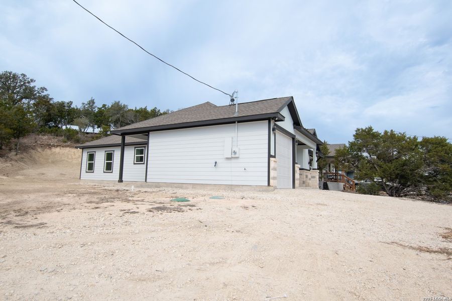 Exterior details and patio area of a home in , Spring Branch (Image 16). Exterior details and patio area of a home in , Spring Branch (Image 16).