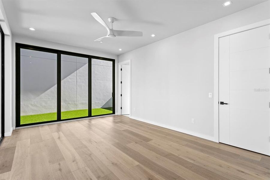 Spacious, unfurnished interior of a new home in , Indian Rocks Beach (Image 54).