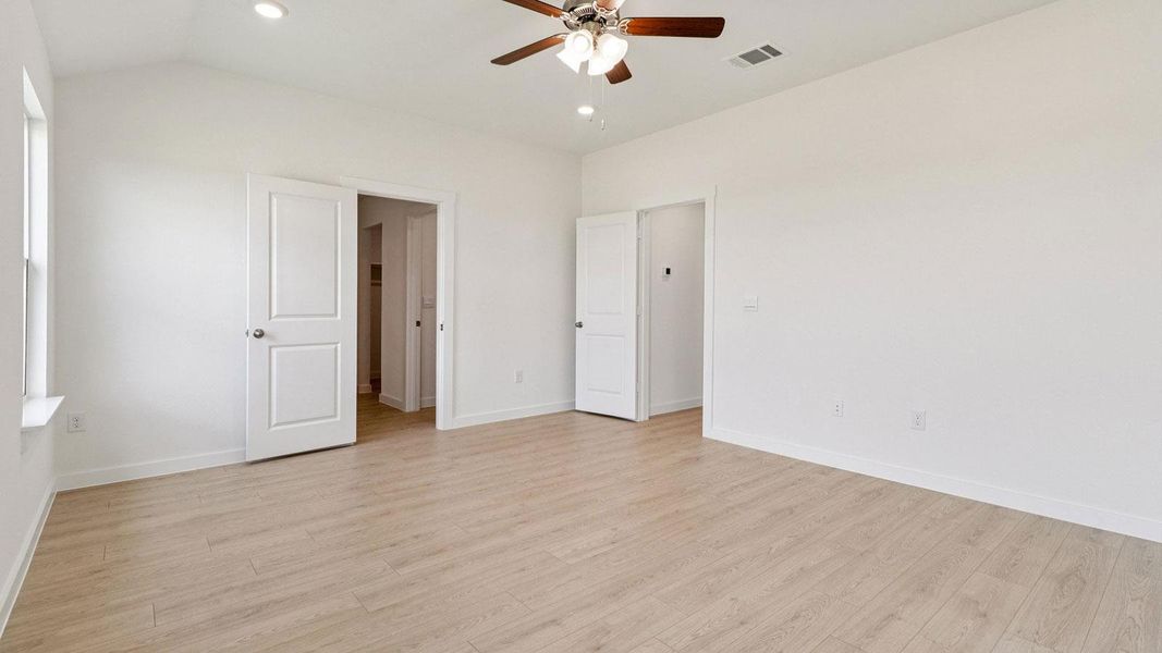 Spacious, unfurnished interior of a new home in Monarch Ranch, Manor (Image 21).