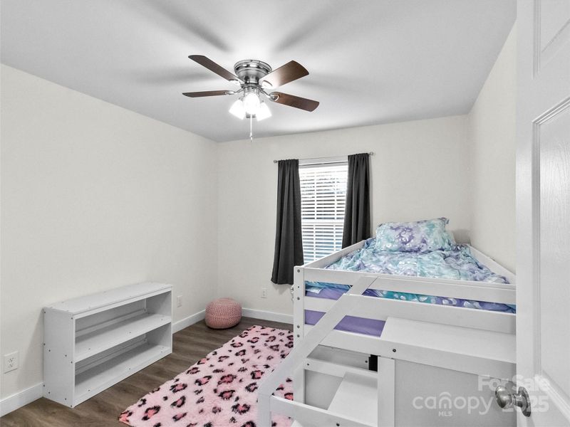 The 3rd Roomy Bedroom (with Childs Loft Bed, Dresser, Desk, and Bookcase (that may convey with an appropriate offer)