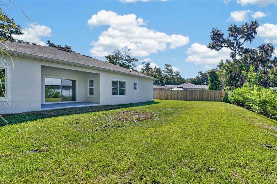 Exterior details and patio area of a home in , New Smyrna Beach (Image 26).