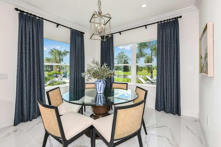 Representative furnished interior of a home built from the Applause by Neal Communities in Boca Royale Golf & Country Club at Wellen Park, Englewood (Image 5).