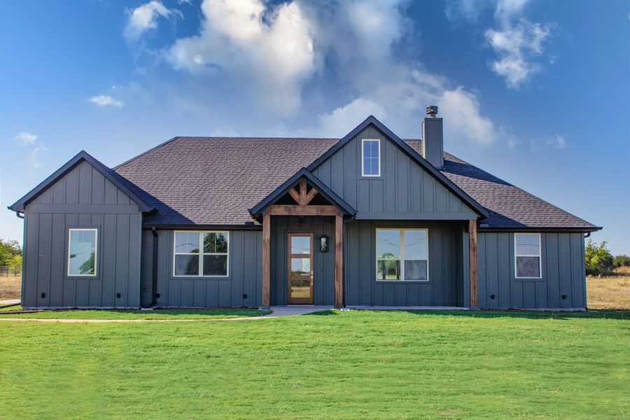Representative exterior photo of a completed home built from the Abrams by Trinity Classic Homes in Freeman Ranch, Weatherford, TX (Image 2).