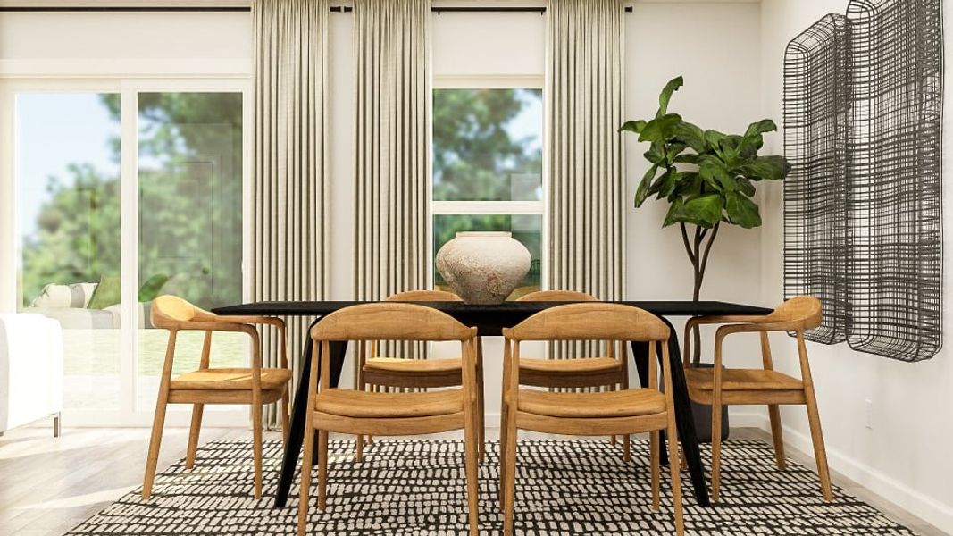 A table with chairs around it. A table with chairs around it.