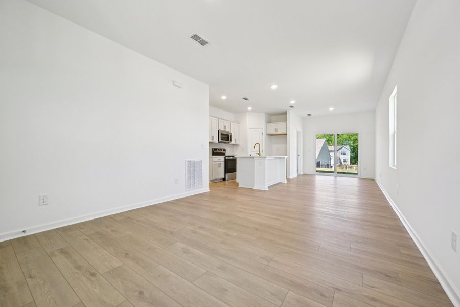 Representative unfurnished interior of a home built from the Grove by Ashton Woods in Middleton Farms, Middlesex (Image 13).