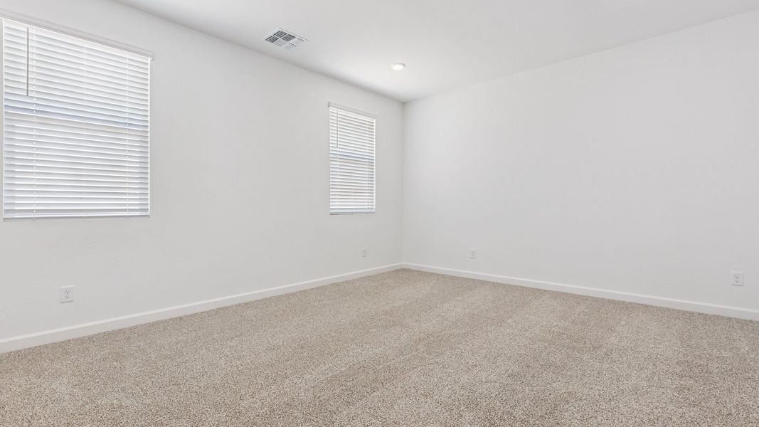 Spacious, unfurnished interior of a new home in Zanjero Pass, Waddell (Image 25).