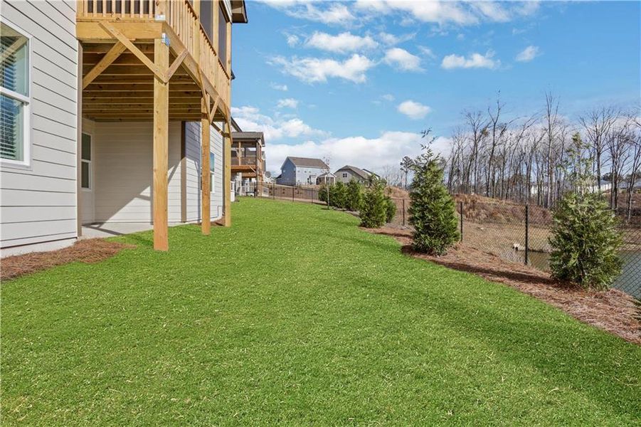 Exterior details and patio area of a home in Twin Lakes, Hoschton (Image 28).