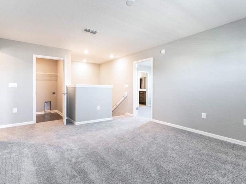 Plus, this home includes flexible-use rooms such as this bonus area at the top of the stairs - Wayfair III by Highland Homes Plus, this home includes flexible-use rooms such as this bonus area at the top of the stairs - Wayfair III by Highland Homes