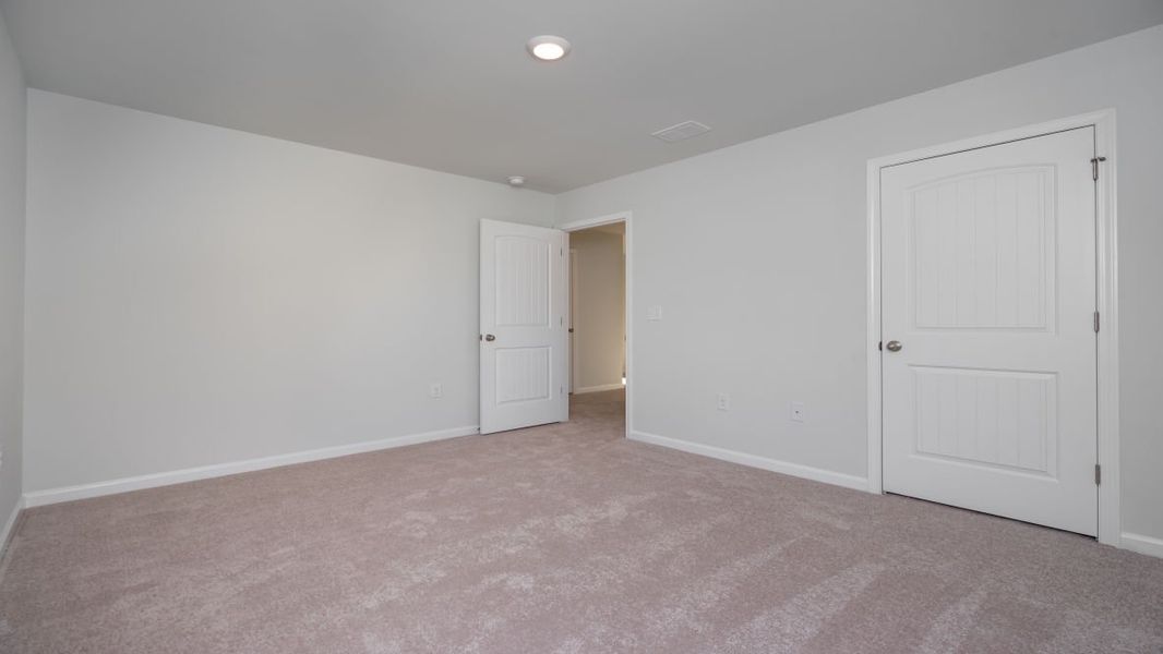Spacious, unfurnished interior of a new home in Cedar Hill Landing, Navassa (Image 35).