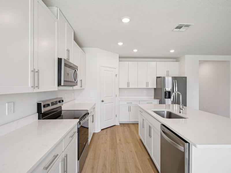 Furnished interior view inside a new home in Oakfield Trails - Classic Series, Parrish (Image 4).