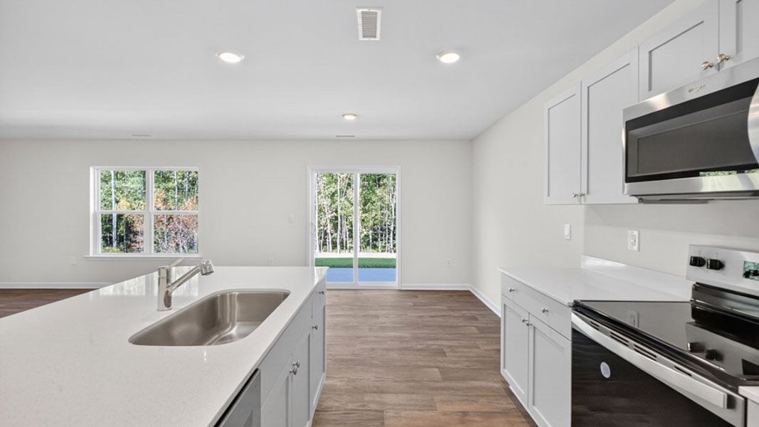 Furnished interior view inside a new home in Mangum Farms, Stem (Image 5).