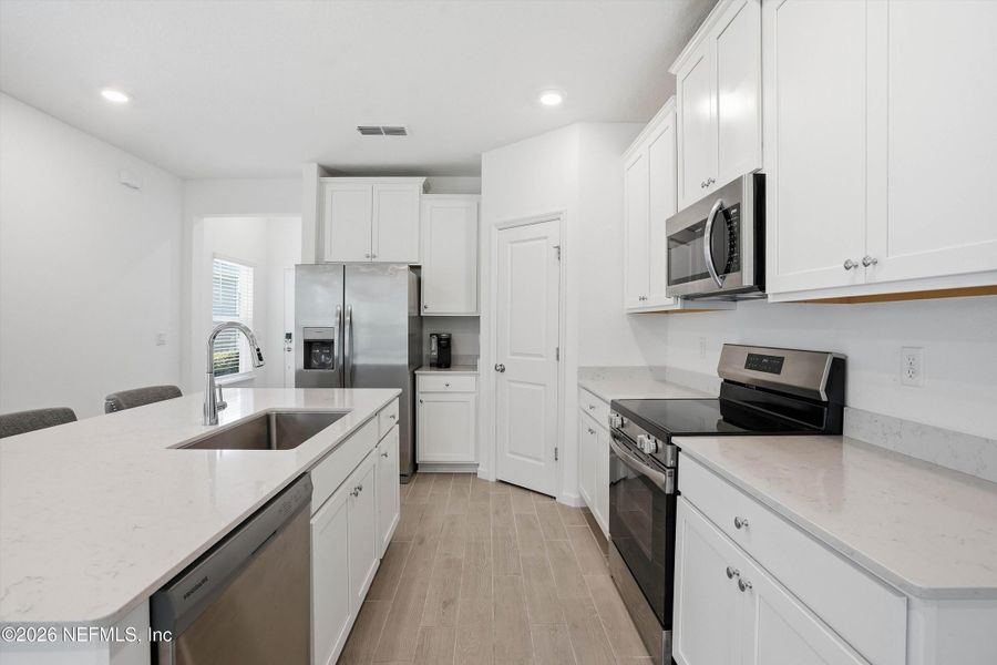 Furnished interior view inside a new home in , Jacksonville (Image 11).